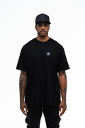 Camiseta oversize negra con letras blancas Iterniti para outfit urbano en Colombia