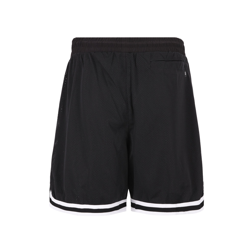 Mesh Shorts de Half time es la pieza definitiva de confort y estilo urbano. Confeccionado en tejido de malla altamente transpirable, su corte regular garantiza libertad total de movimiento para cualquier actividad. Su diseño destaca por un estampado frontal en gris sutil, integrando el isotipo de la marca y el icónico número "23", junto a detalles de ribetes en contraste. Una prenda excepcionalmente fresca y ligera, diseñada para quienes buscan funcionalidad técnica sin sacrificar la estética sport-luxe.